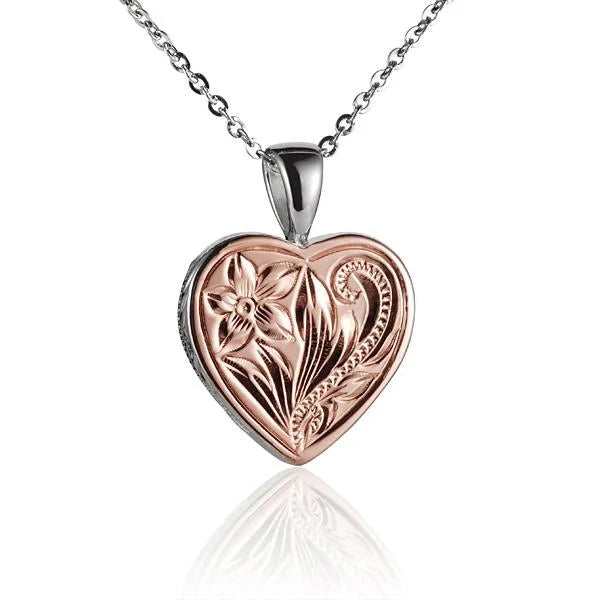 Hawaiian 925 Sterling Silver scroll heart pendant featuring intricate design.