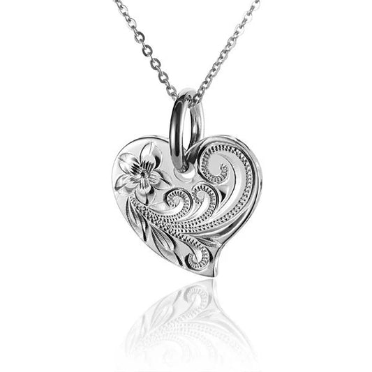 Ashley’s Gift Shop scroll heart side cut pendant featuring a delicate heart-shaped design with intricate scrollwork.