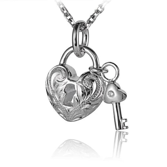 Scroll Heart with Key pendant, delicate jewelry featuring a detailed scroll heart design and a small key charm.