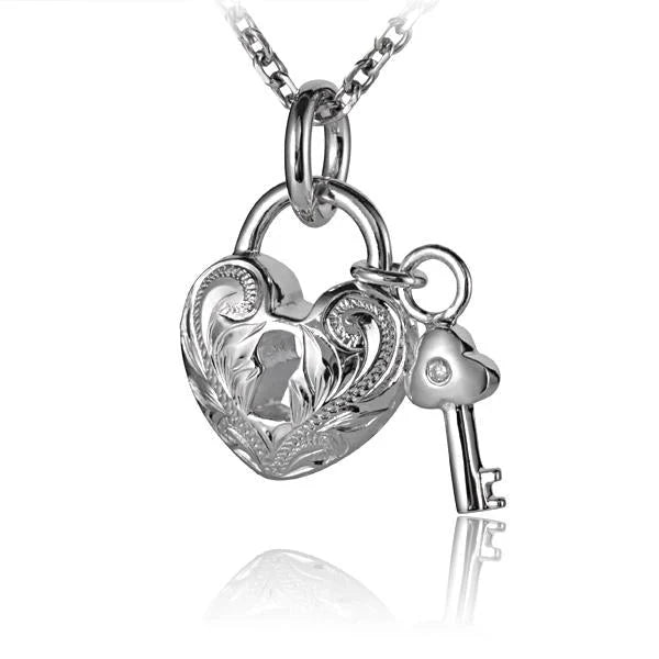 Hawaiian 925 Sterling Silver scroll heart pendant with key design, featuring intricate details and a polished finish.