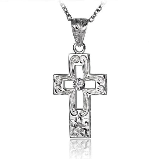 Hollow scroll cross pendant with 1 carat cubic zirconia from Ashley's Gift Shop, featuring intricate metalwork and elegant design.