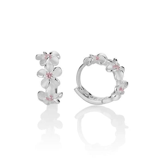 Sterling silver plumeria pink cubic zirconia hook earrings featuring floral design, crafted by Ashley's Gift Shop.