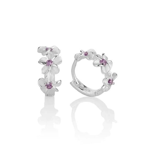 Sterling silver plumeria purple CZ hook earrings featuring floral design, crafted by Ashley's Gift Shop.