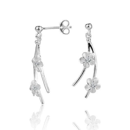 Sterling silver bead and plumeria wire earrings featuring two plumeria flowers, crafted by Ashley's Gift Shop.