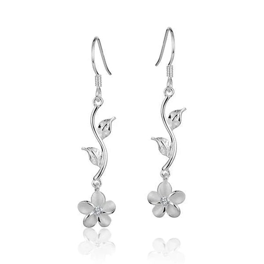Sterling silver Plumeria pendant from Ashley's Gift Shop featuring a delicate floral design on a silver chain.