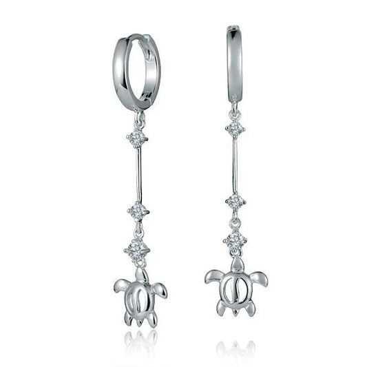 Sterling silver hoop earrings with three cubic zirconia stones and dangling honu turtle charm, sterling silver jewelry.