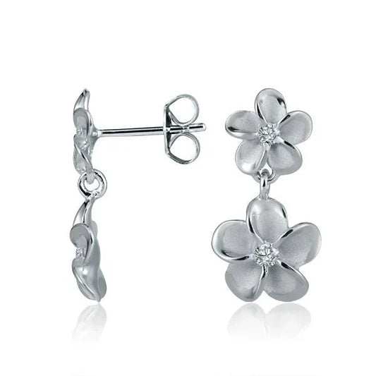 Sterling silver Plumeria CZ earrings with rhodium plating, 8mm and 10mm size, featuring floral design from Ashley's Gift Shop
