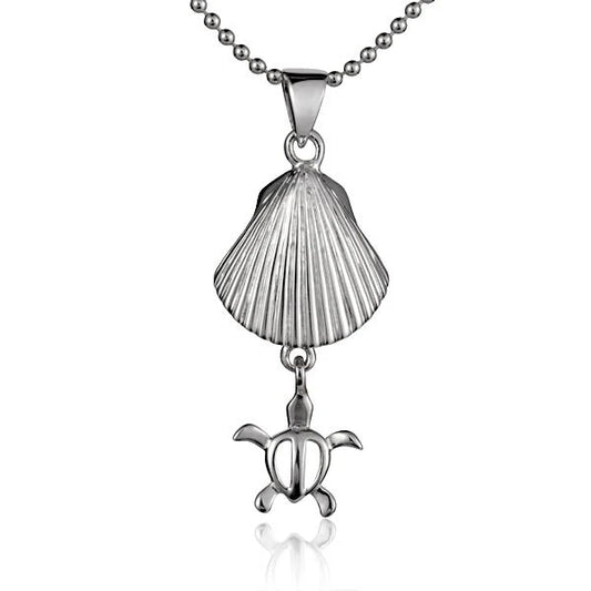 Shell Honu pendant featuring a carved turtle design, crafted from polished shell, hanging from a delicate chain.