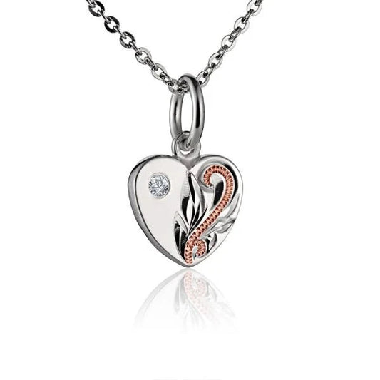Sterling silver small scroll heart pendant with cubic zirconia accents, crafted by Ashley's Gift Shop.