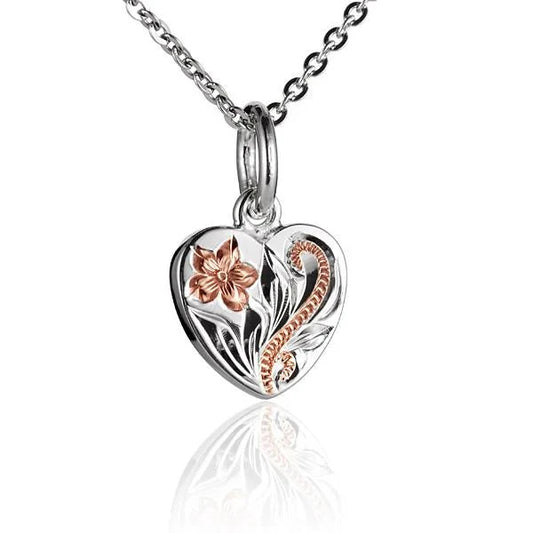 Small scroll heart pendant made of 925 sterling silver with intricate detailing, perfect for layered jewelry or delicate necklaces.