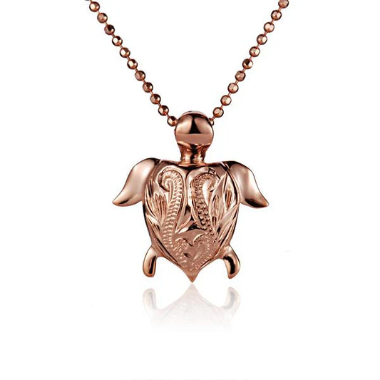 Small turtle scroll pendant featuring a detailed turtle design, crafted by Ashley's Gift Shop.