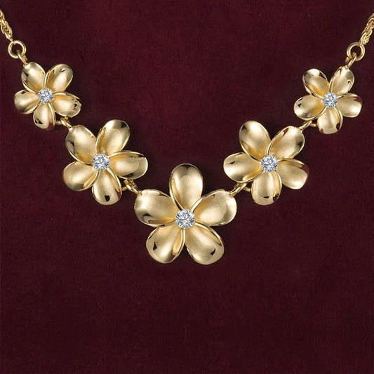 Sterling silver Plumeria Rope YG Coating necklace with 12-18mm diameter, featuring detailed floral design by Ashley's Gift Shop.