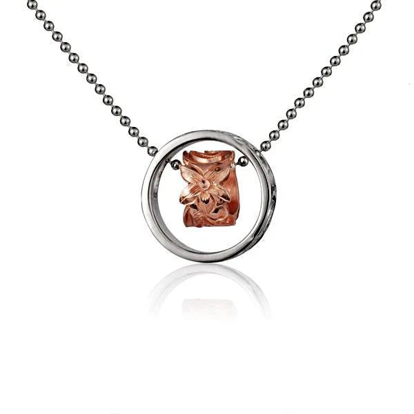 Hawaiian 925 Sterling Silver sP Scroll Circle and Pink Scroll Ring Pendant featuring intricate designs and a polished finish.