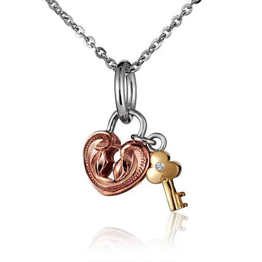 Small Ashley's Gift Shop SP Scroll Heart with Key Pendant featuring a detailed heart and key design on a silver-tone chain.