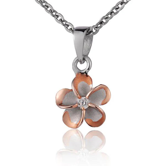 Sterling silver Plumeria CZ PG pendant with 8mm flower design, crafted in rhodium finish, from Ashley's Gift Shop.