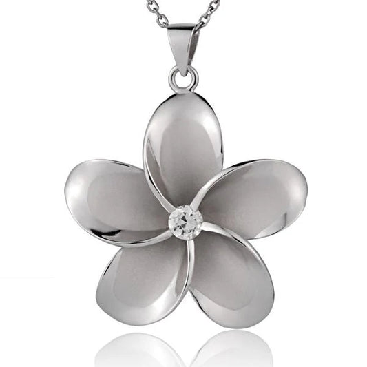 Sterling silver Plumeria CZ pendant, 45mm with rhodium finish, featuring intricate floral design and sparkling gemstone accents.