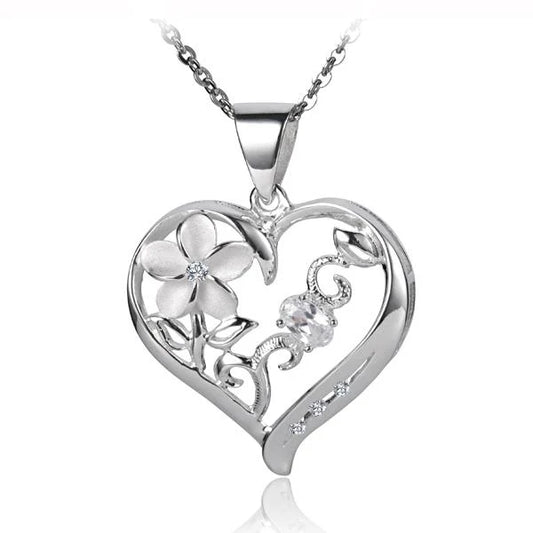 Sterling silver Plumeria Heart Pendant with intricate flower design, featuring a polished finish and a delicate chain.