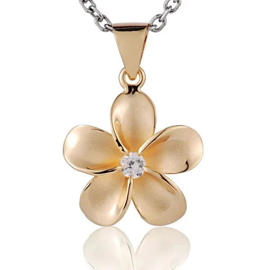 Sterling silver Plumeria CZ pendant, 20mm, with yellow gold plating, featuring intricate floral design and sparkling cubic zirconia stones.