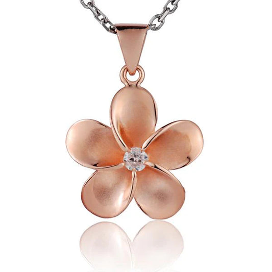 Sterling silver Plumeria CZ pendant, 22mm size, featuring a floral design with cubic zirconia stones, by Ashley's Gift Shop.
