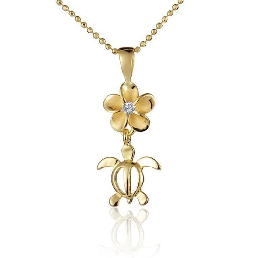 Sterling silver Plumeria CZ Honu pendant with 8mm yellow gold vermeil accents, crafted in 925 sterling silver.