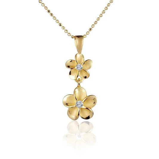 Sterling silver Plumeria CZ pendant with yellow gold accents, 8-10mm size, showcasing intricate floral design on a white background.