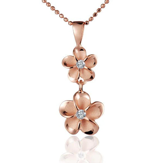 Sterling silver Plumeria CZ PG pendant featuring an 8mm flower design, crafted by Ashley's Gift Shop.