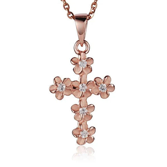 Sterling silver Plumeria CZ cross pendant with 4mm stones, featuring a delicate design, perfect for jewelry and gift-giving.