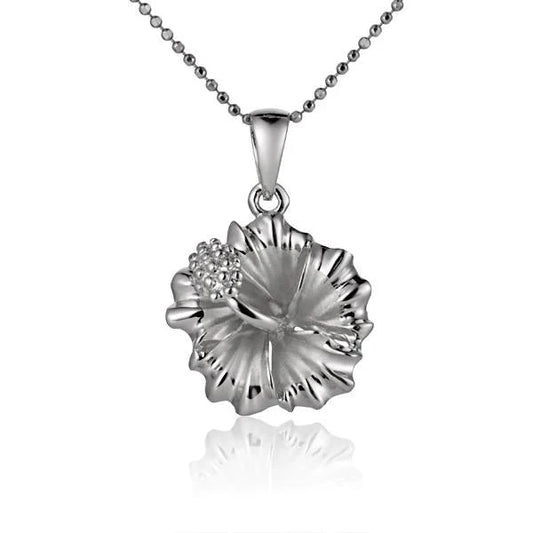 Sterling silver Hibiscus Rhodium pendant, 15mm, featuring intricate floral design, from Ashley's Gift Shop.