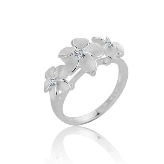Sterling silver Plumeria CL CZ ring with floral design, featuring sparkling cubic zirconia accents, crafted by Ashley's Gift Shop