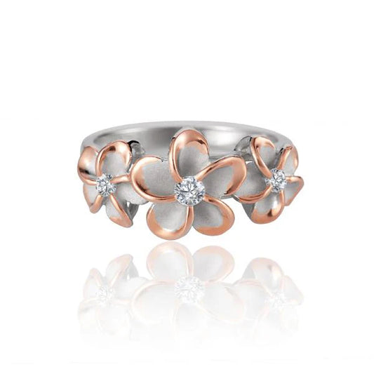 Sterling silver Plumeria CZ ring with 8mm, 10mm, 8mm gemstones, rhodium plating, featuring a floral design.