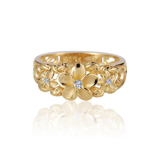 Sterling silver Plumeria Scroll CZ ring with yellow gold plating, featuring intricate floral design and sparkling cubic zirconia accents.