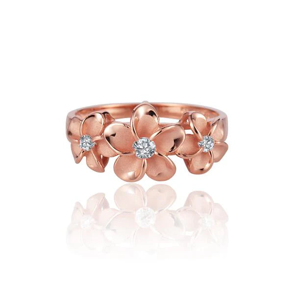 Hawaiian 925 Sterling Silver plumeria CZ ring with pink plating, featuring 8mm and 10mm stones.