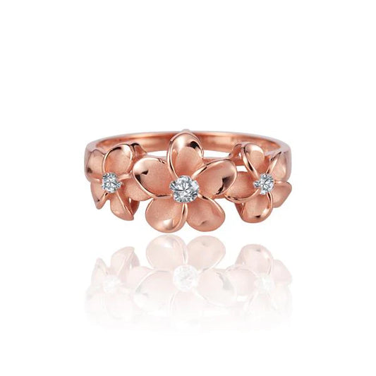 Sterling silver 8mm plumeria CZ ring with rose gold plating, featuring detailed flower design, by Ashley's Gift Shop.