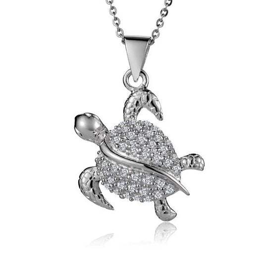 Swimming CZ turtle pendant featuring sparkling cubic zirconia stones, crafted by Ashley's Gift Shop.