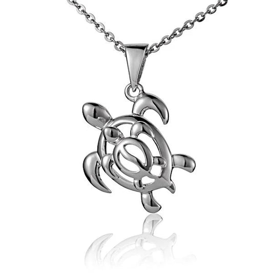 Swimming Honu-Honu pendant featuring a sea turtle design, crafted by Ashley's Gift Shop, displayed on a plain background.