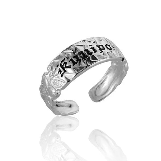 Sterling silver Kuuipo scroll toe ring featuring intricate design, perfect for stylish beach or casual wear.