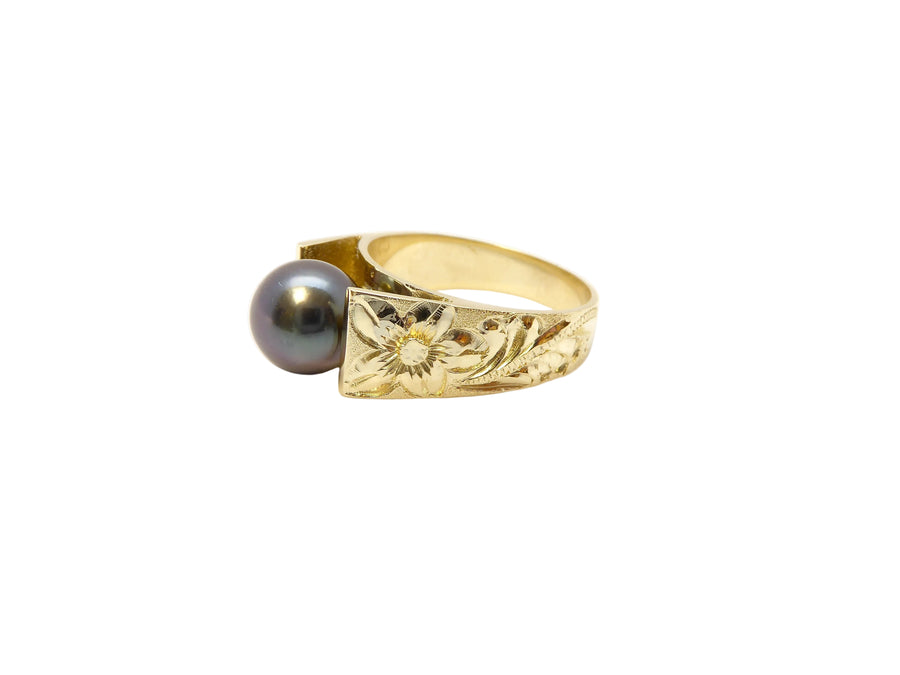 Hawaiian 14K Gold french mount earring with a black pearl.