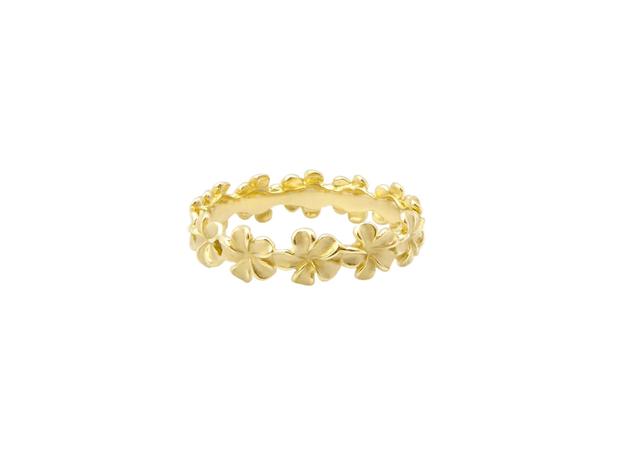 Hawaiian 14K Gold plumeria eternity ring in size 8 with 5mm band, featuring intricate floral design and shiny polished.