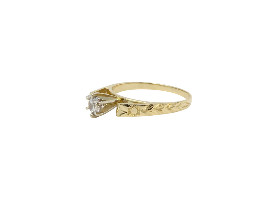 Hawaiian 14K Gold french mountain ring with 2mm band and 0.25 ct cubic zirconia.