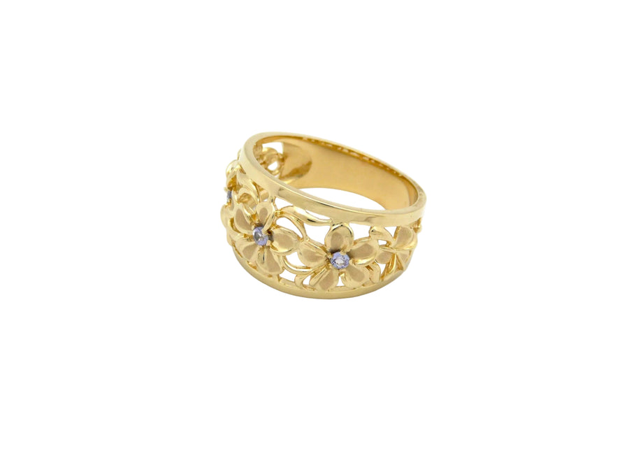 Hawaiian 14K Gold five-flower ring with Tanzanite gemstone in size 8, featuring intricate floral design and polished finish.