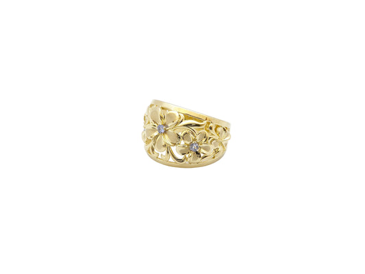 Hawaiian 14K Gold 5-flower ring with Tanzanite gemstone, size 8, featuring delicate floral design.